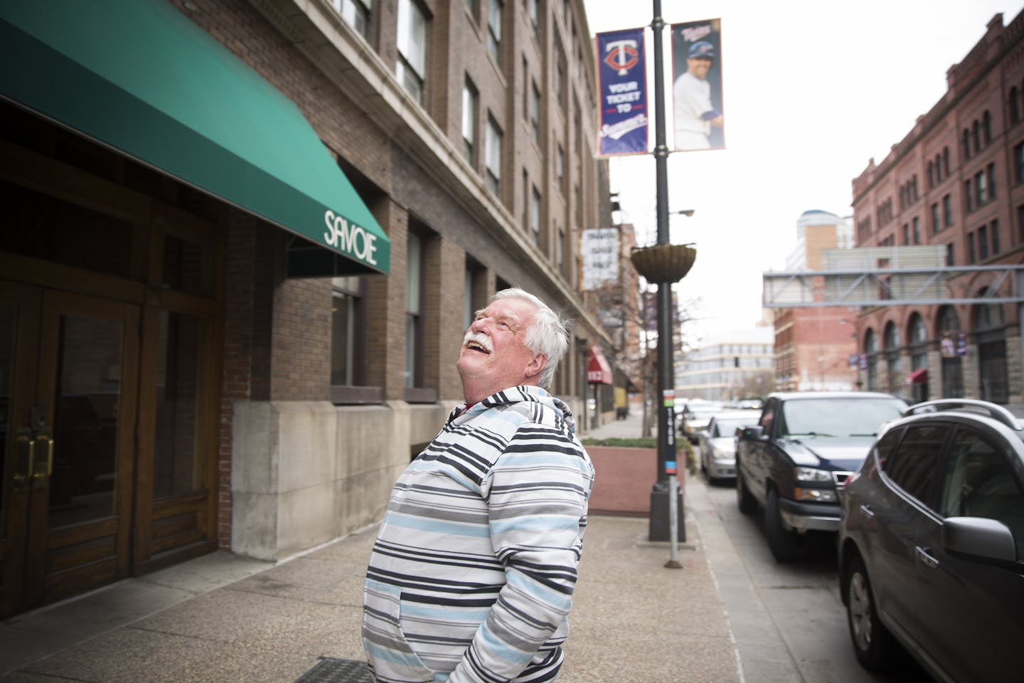 Chuck Gross, the owner of the Savoie Building in the North Loop, checks out the new awning outside the entrance to his building on Monday, April 20, 2015. ] LEILA NAVIDI leila.navidi@startribune.com /