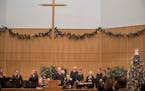 Members of the church sang during worship services at the Salvation Army Center in Maplewood in December 2017. Food, housing, emergency assistance and