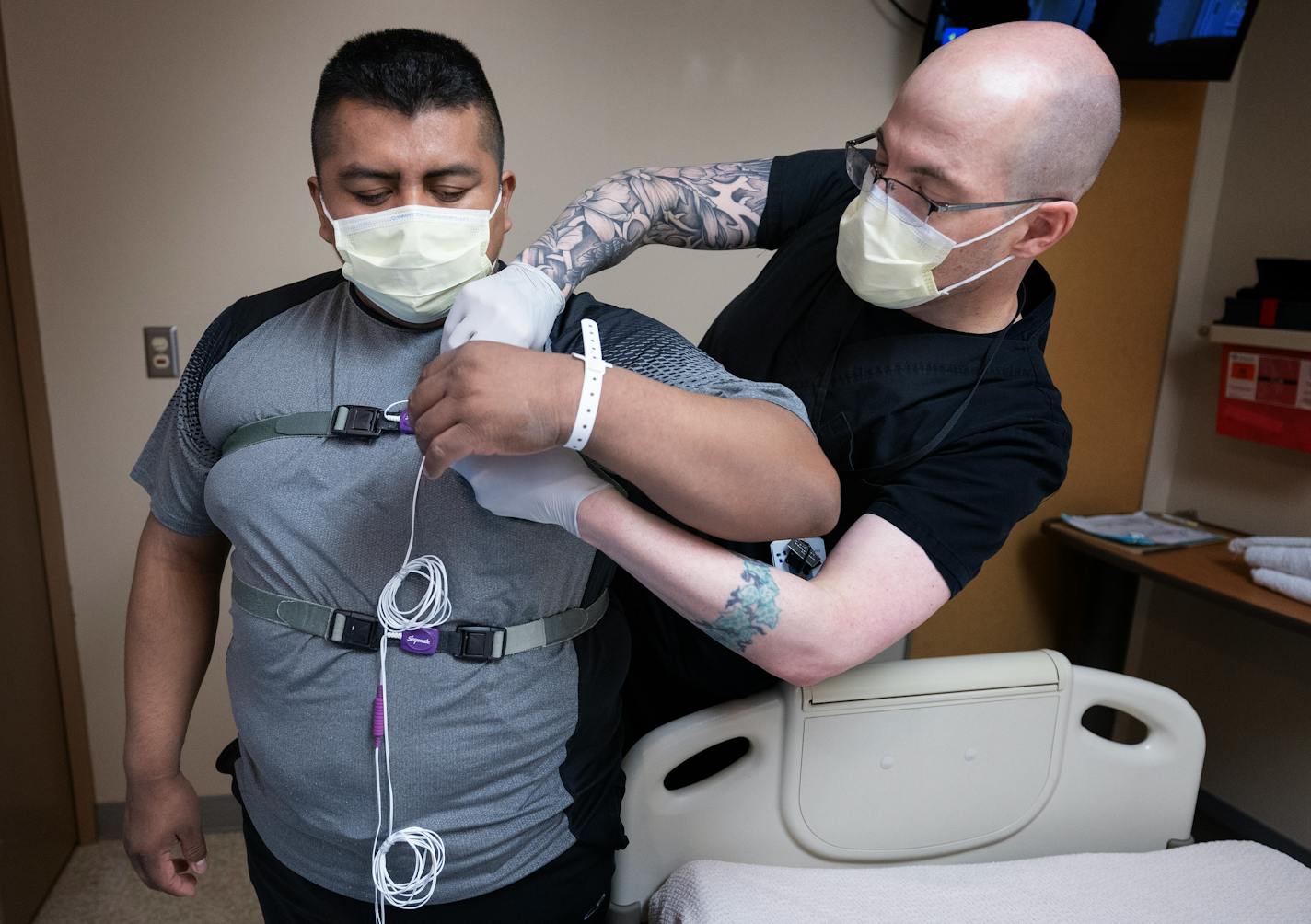 Electrodes and wires were placed on Luis Vega, 32 as Registered Polysomnographic Technologist Adam Kornmeyer prepares him for a sleep study Monday, January 8, 2024, at HCMC in Minneapolis, Minn. ] CARLOS GONZALEZ • carlos.gonzalez@startribune.com