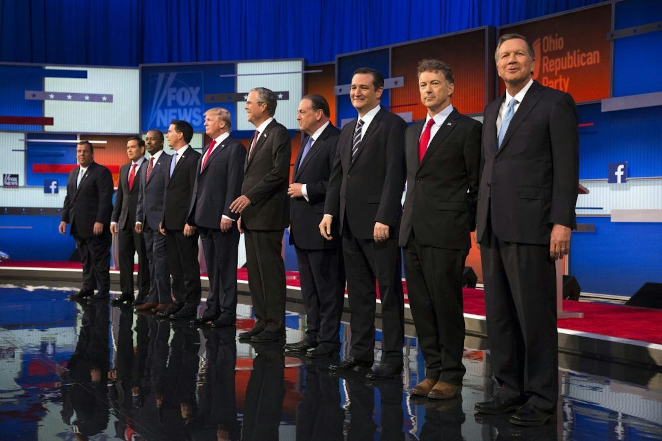 Republican presidential candidates from left, Chris Christie, Marco Rubio, Ben Carson, Scott Walker, Donald Trump, Jeb Bush, Mike Huckabee, Ted Cruz, Rand Paul, and John Kasich take the stage for the first Republican presidential debate at the Quicken Loans Arena Thursday, Aug. 6, 2015, in Cleveland.