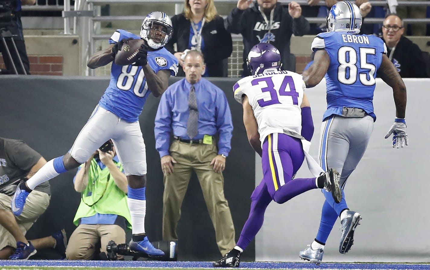 Detroit Lions wide receiver Anquan Boldin (80) caught a first quarter touchdown over Minnesota Vikings strong safety Andrew Sendejo (34) at Ford Field Sunday November 24 ,2016 in Detroit MI.