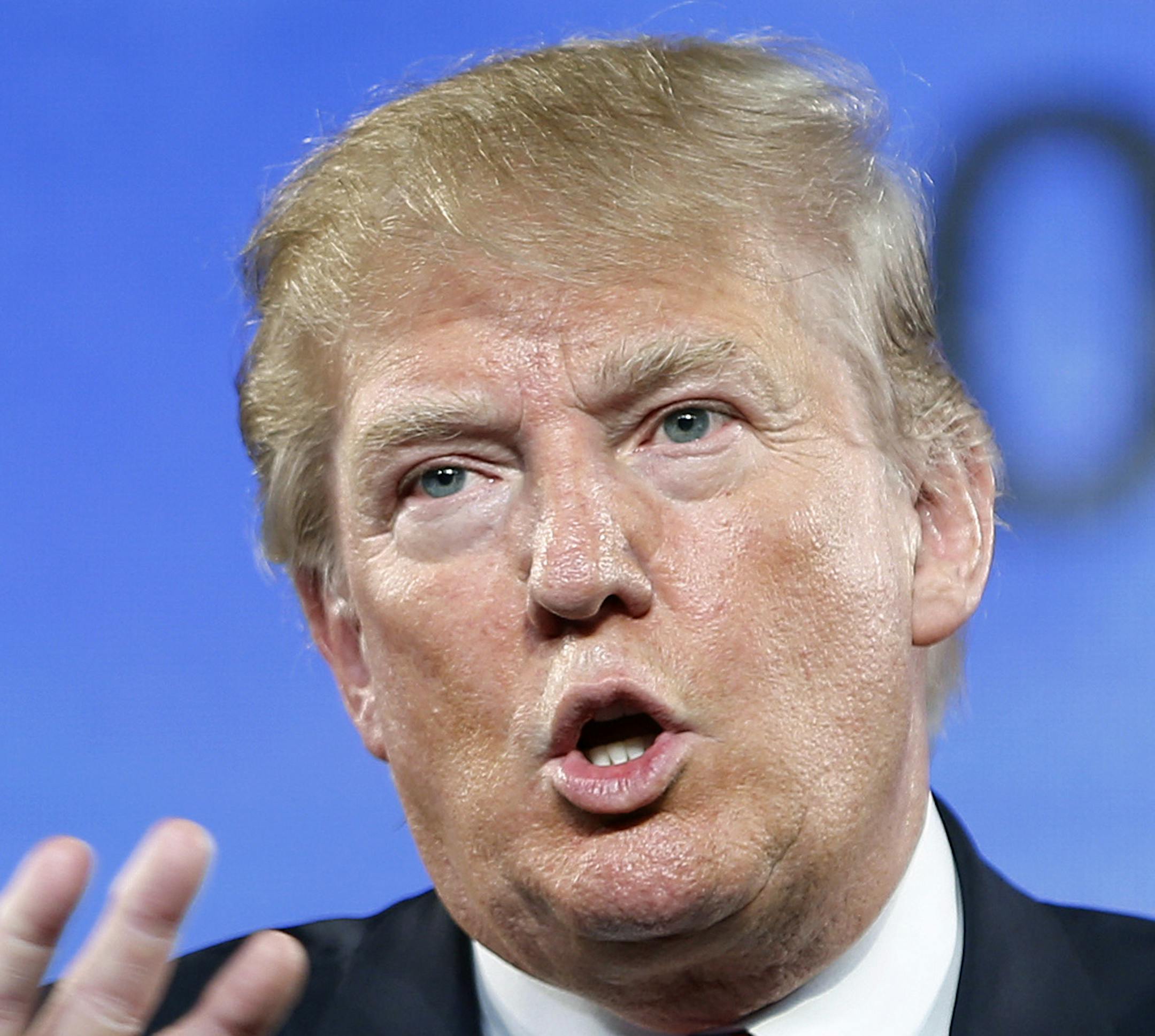 FILE - In this July 11, 2015, file photo, Republican presidential candidate Donald Trump speaks at FreedomFest in Las Vegas. Trump criticized Sen. John McCain's military record at a conservative forum Saturday, saying the party's 2008 nominee and former prisoner of war was a "war hero because he was captured. I like people who weren't captured." McCain spent 20 years in the Navy, a quarter of it in a Vietnamese prisoner of war camp after his jet was shot down over Hanoi during a bombing mission