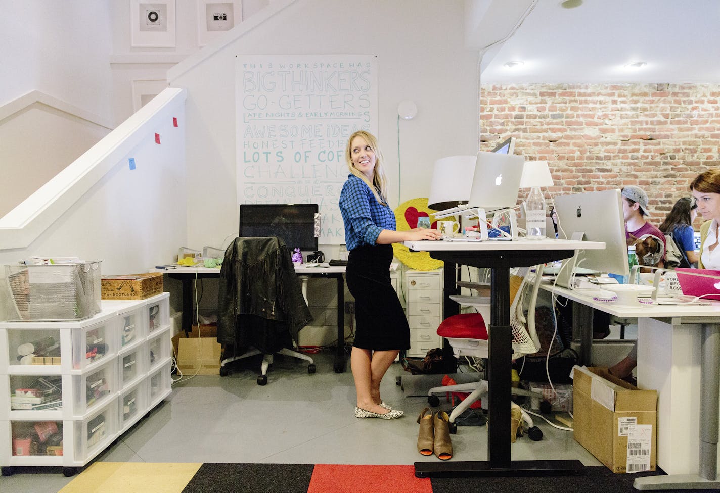 Lisa Raphael of the website Brit & Co. wears flats at her standing desk and admits to having a &#x201c;shoe village&#x201d; under her desk.