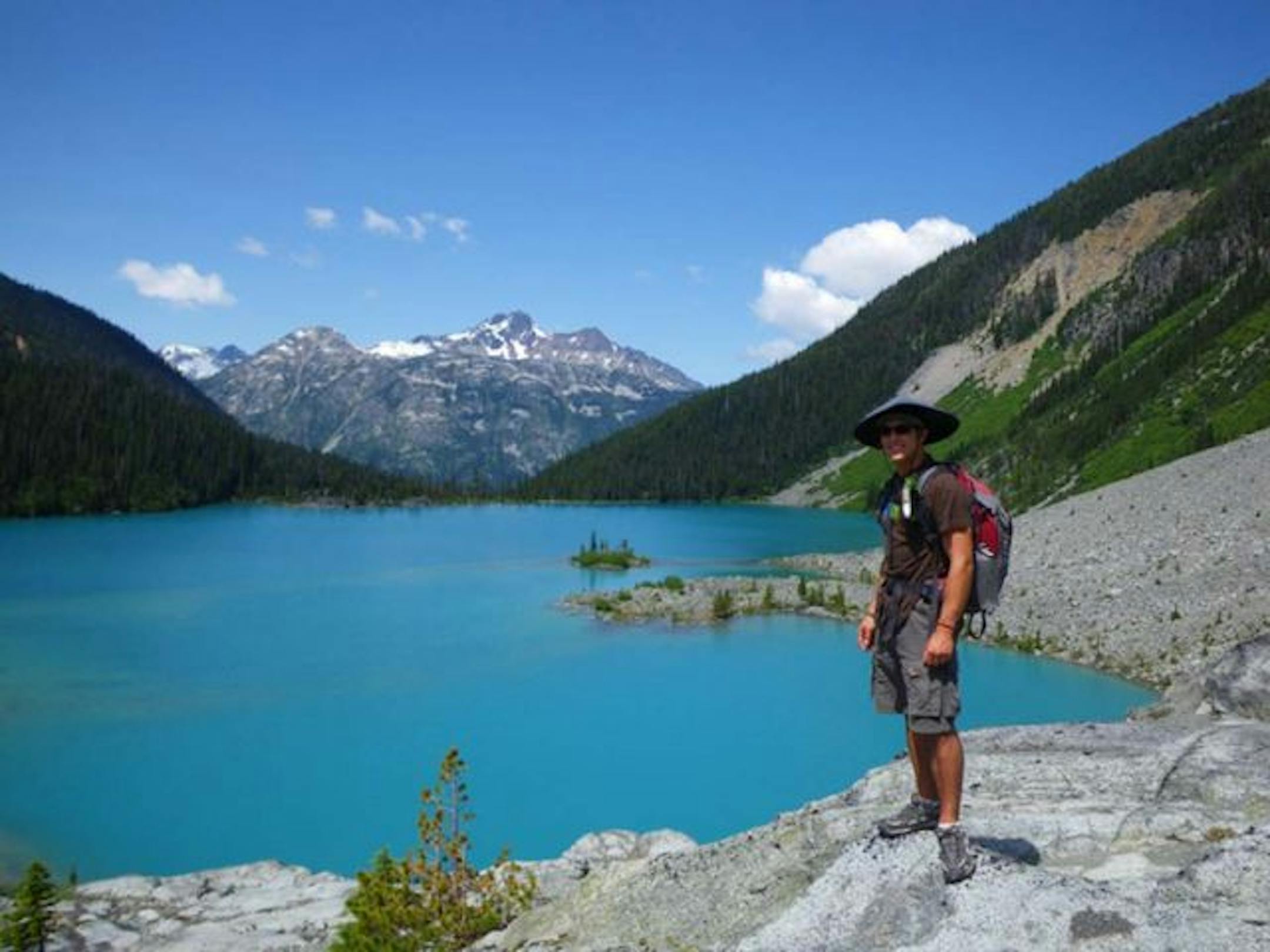 Tour leader Matt Delaney at Upper Lake in the Joffre Lakes Provincial Park. Matier Glacier, seen in the background, filters into the three lakes in the area.