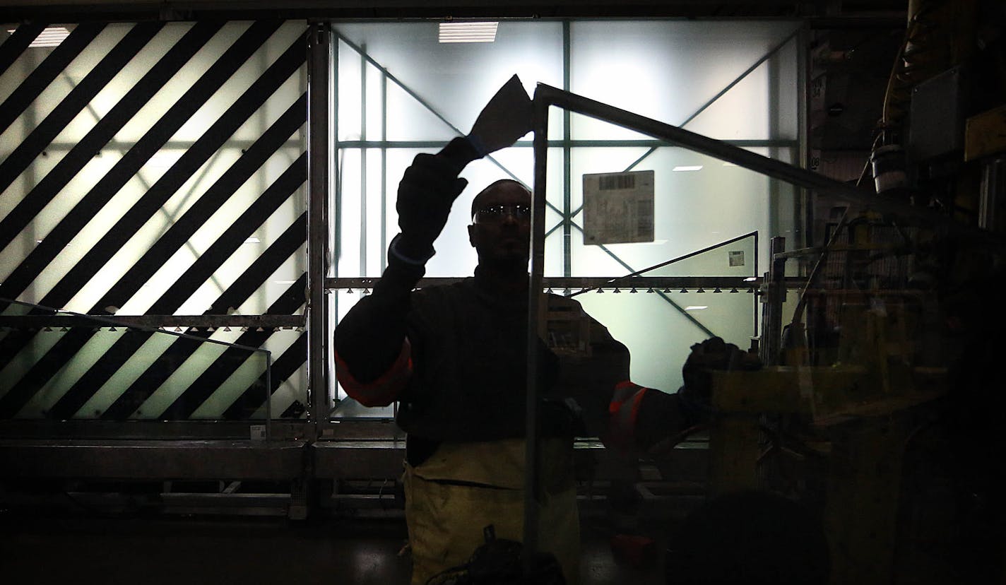 A Viracon worker prepared a panel of glass for shipping the installer for construction of the new Vikings Stadium. ] JIM GEHRZ &#xef; james.gehrz@startribune.com / Owatonna, MN / February 12, 2015 /11:00 AM - BACKGROUND INFORMATION: Glass maker Viracon begins producing the windows for the new Vikings Stadium in February. We have been invited in for a tour. The company CEO will see some of the first windows roll off the production line. The plant is in Owatonna.