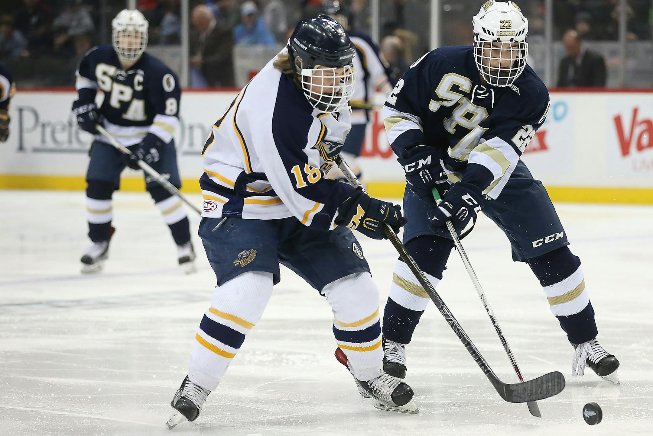 Hermantown'sTyler Watkins and St. Paul Academy's Will Kelly battled for the puck during the first period of the Class 1A boys' hockey semifinals, Friday, March 4, 2016 at Xcel Energy Center in St. Paul, MN. ] (ELIZABETH FLORES/STAR TRIBUNE) ELIZABETH FLORES • eflores@startribune.com