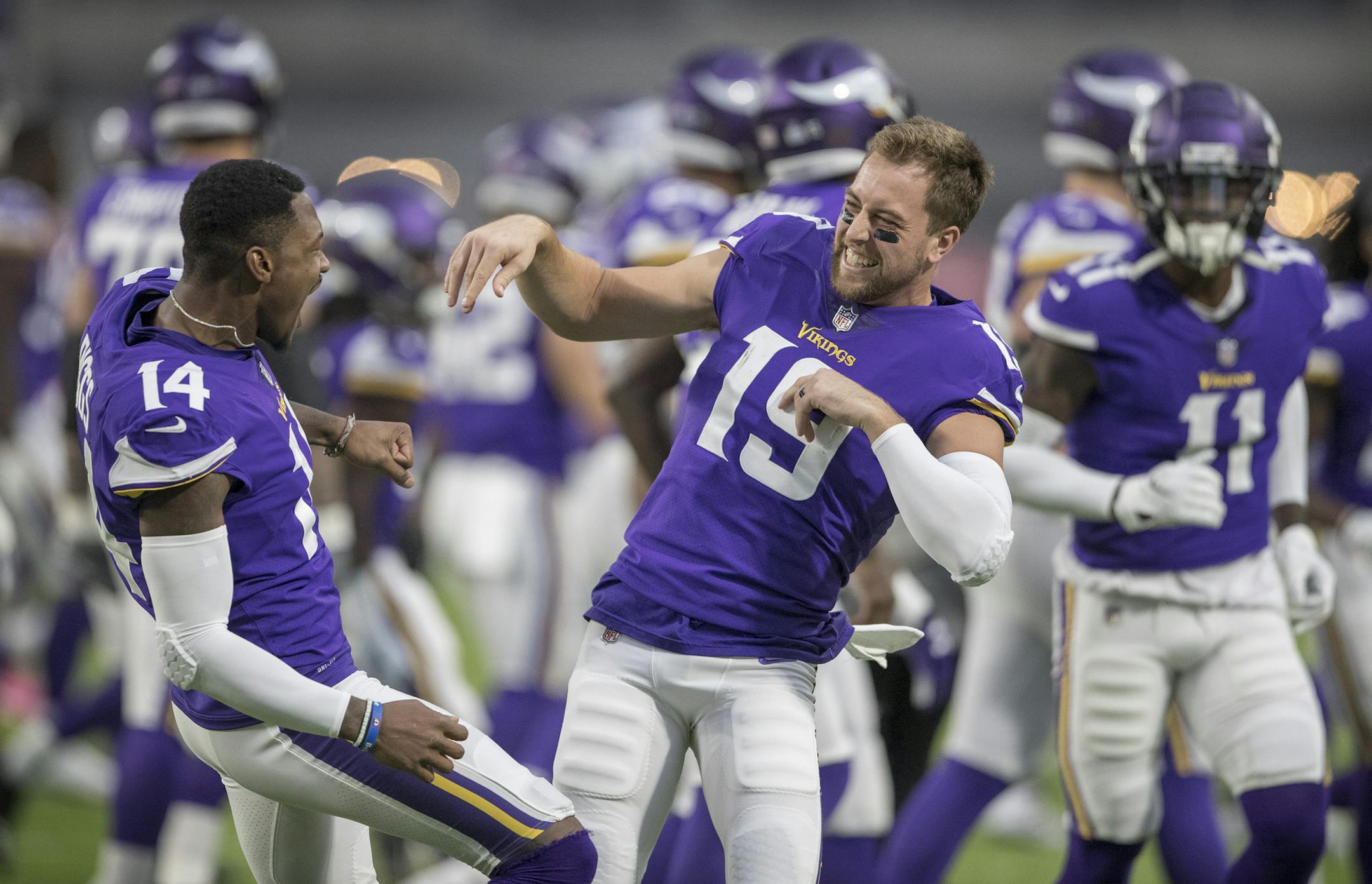 Minnesota Vikings wide receiver Stefon Diggs (14) left a receiver Adam Thielen (19) played around as the offense was introduced at U.S. Bank Stadium Sunday October 14, 2018 in Minneapolis, MN. ] The Minnesota Vikings hosted the Arizona Cardinals at U.S. Bank Stadium JERRY HOLT • jerry.holt@startribune.com