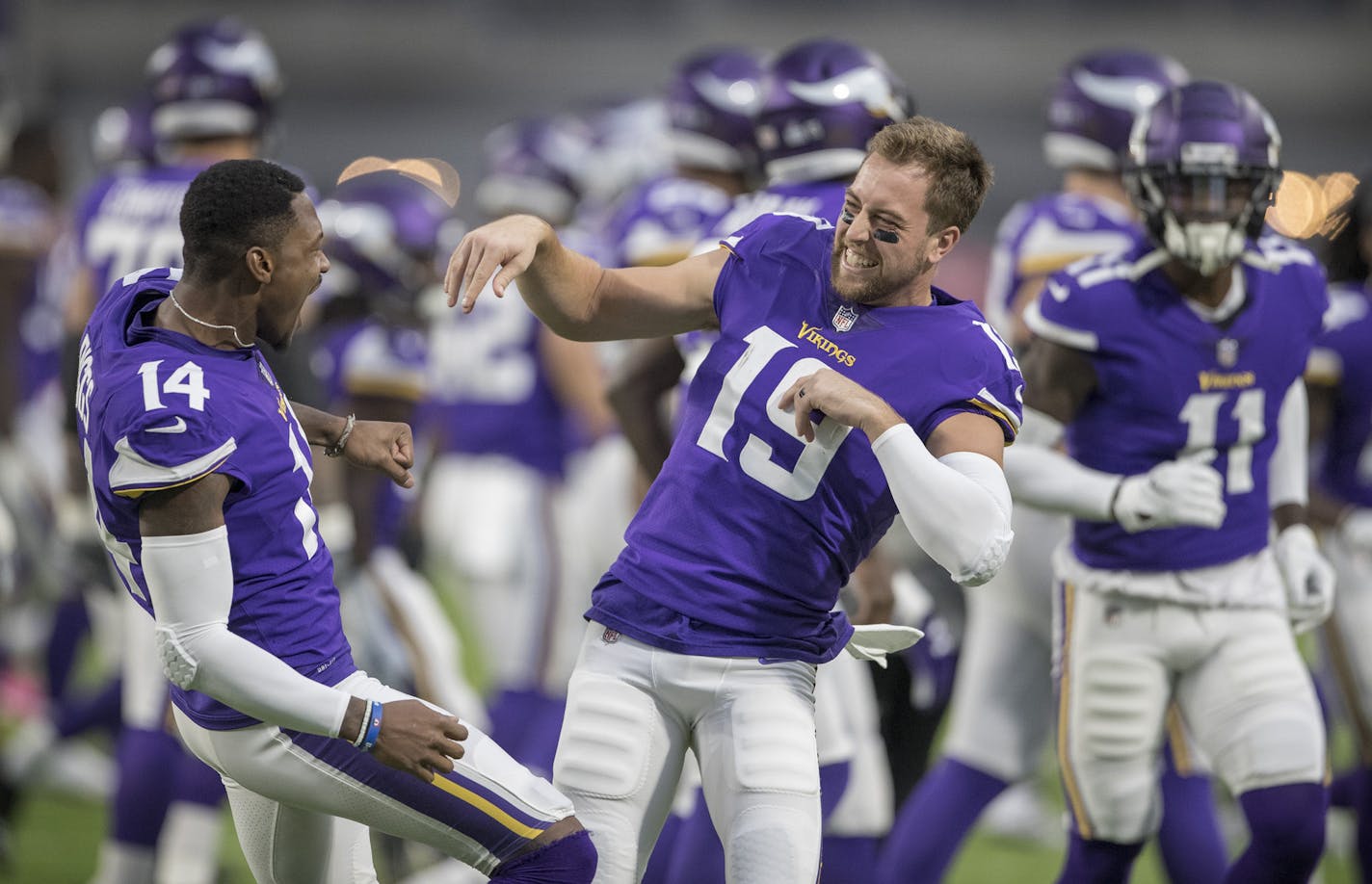 Minnesota Vikings wide receiver Stefon Diggs (14) left a receiver Adam Thielen (19) played around as the offense was introduced at U.S. Bank Stadium Sunday October 14, 2018 in Minneapolis, MN. ] The Minnesota Vikings hosted the Arizona Cardinals at U.S. Bank Stadium JERRY HOLT &#x2022; jerry.holt@startribune.com