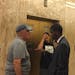St. Paul Mayor Melvin Carter talks to Carl Roith (left), a Frogtown resident who came to City Hall Wednesday to advocate for more police.