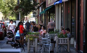 People enjoy restaurants and shopping along Division St. in historic Northfield.