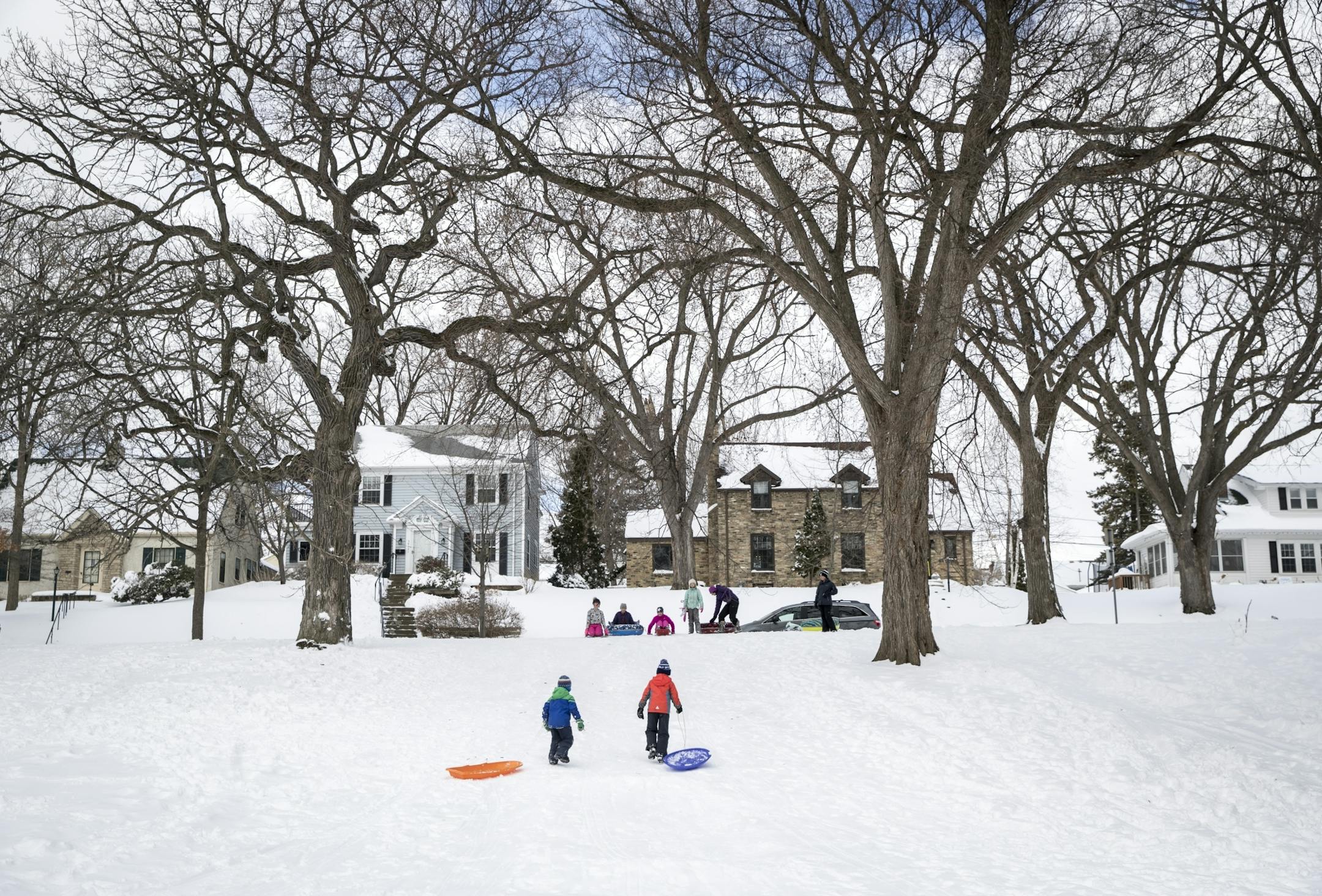 Children who were home from school because of the snow, went sledding at Pearl Park on Monday, April 16, 2018 in Minneapolis, Minn.