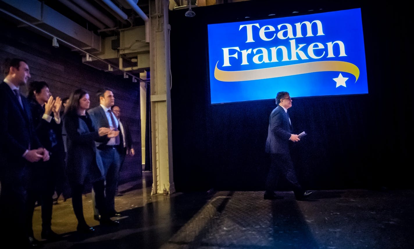 U.S. Sen. Al Franken prepared to thank hundreds of supporters Thursday night in Minneapolis. On the left is his son-in-law Brody Greenwald, wife Franni, daughter Thomasin and son Joe.