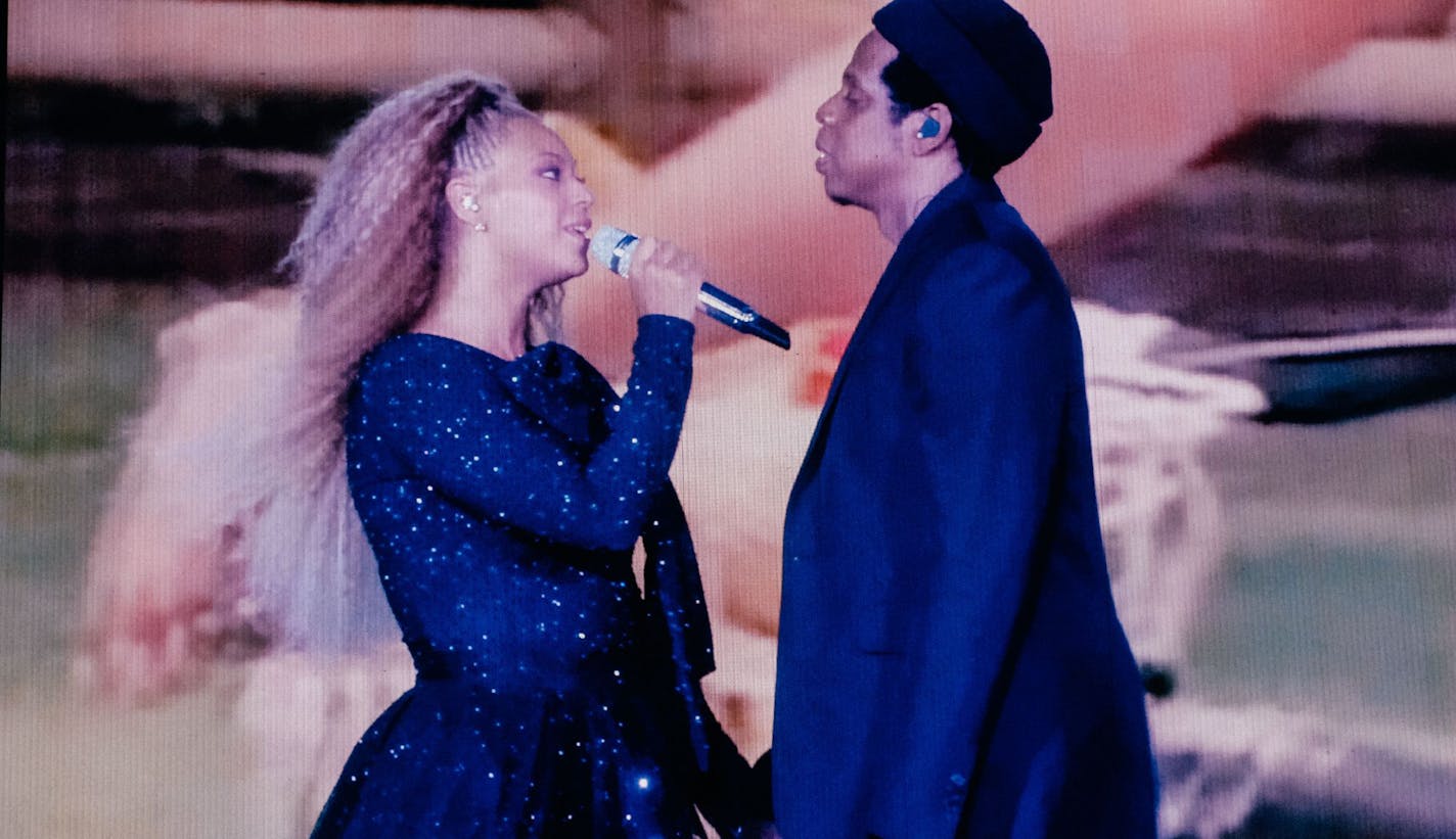 Seen from a large screen, Beyonce and Jay-Z perform at MetLife Stadium in East Rutherford, N.J., Aug. 2, 2018. The performance was part of their joint On the Run II tour, which followed a cycle of albums that turned marital strife into art. (The New York Times) -- NO SALES; FOR EDITORIAL USE ONLY WITH NYT STORY JAYZ BEYONCE REVIEW BY JON CARAMANICA FOR AUG. 03, 2018. ALL OTHER USE PROHIBITED. -- ORG XMIT: MIN2018080715042929