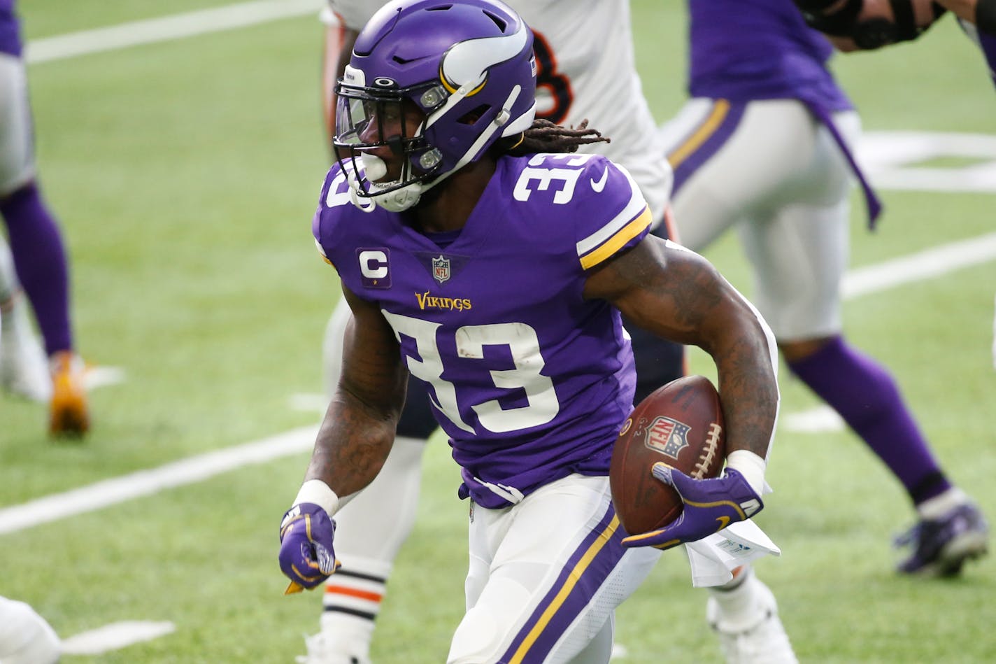 Minnesota Vikings running back Dalvin Cook runs up field during the first half of an NFL football game against the Chicago Bears, Sunday, Dec. 20, 2020, in Minneapolis. (AP Photo/Bruce Kluckhohn)