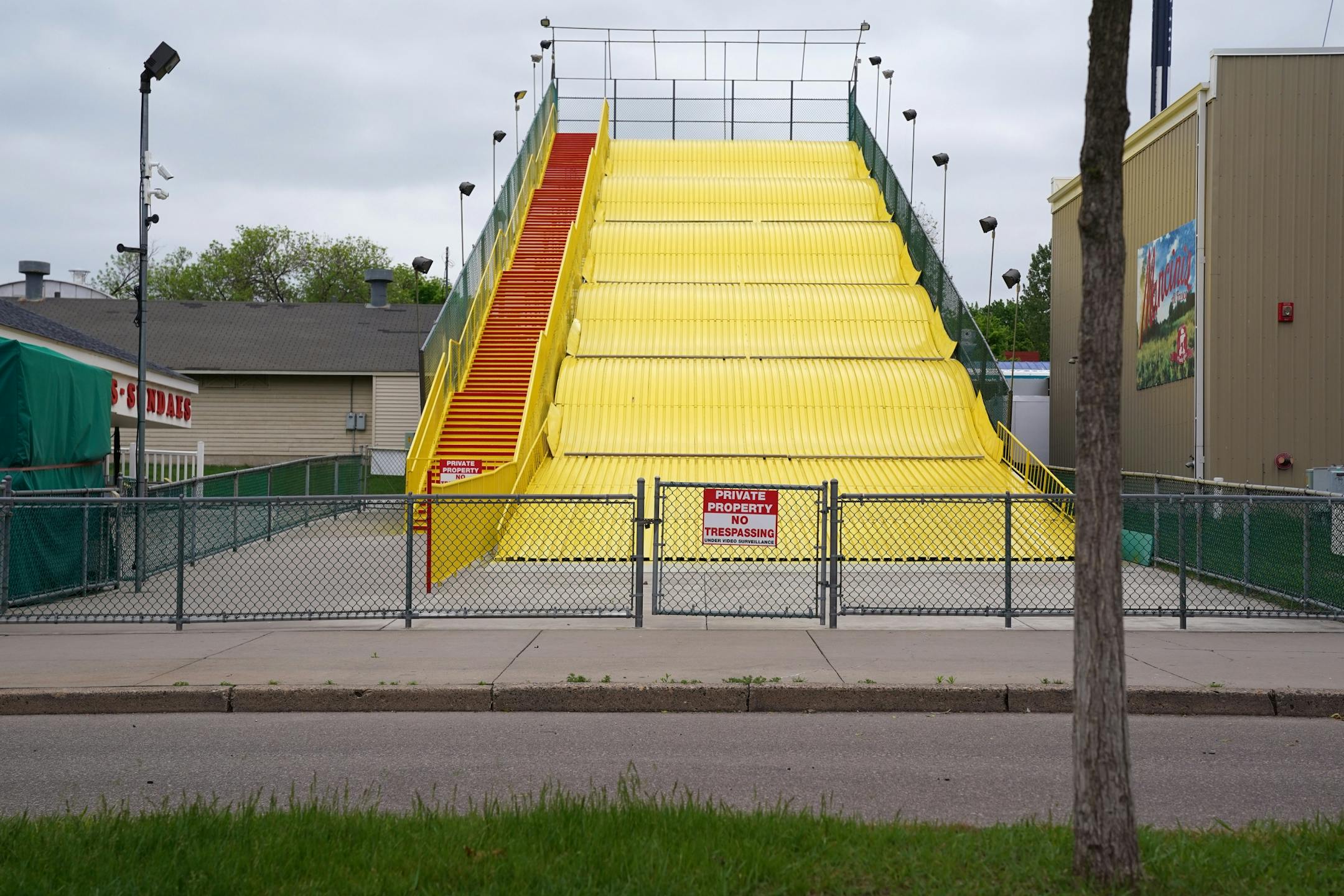 The giant slide sat closed off from the public Thursday.
