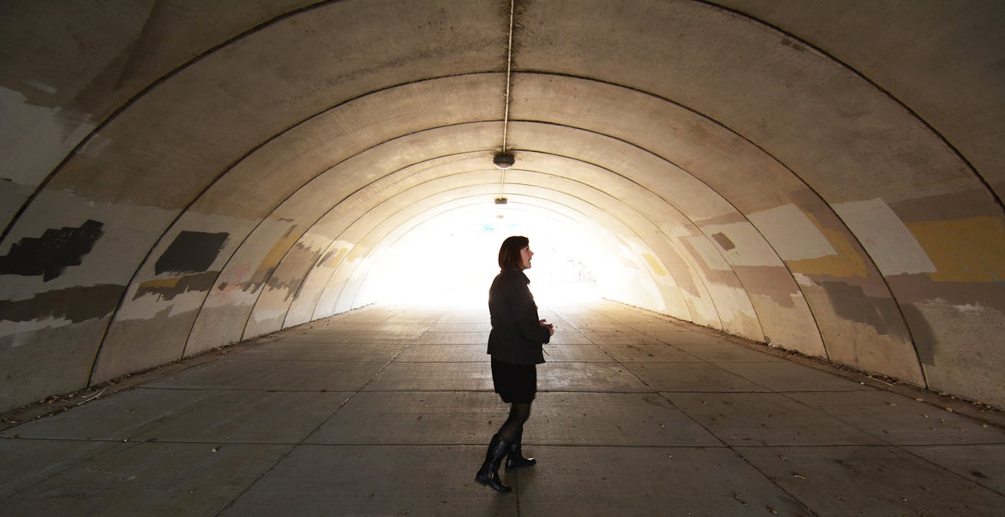 Laura Pecaut, Main Street Coordinator for the Shakopee Chamber and Visitor&#xed;s Bureau, walked through the Holmes Street tunnel. Photos by Liz Rolfsmeier, Special to the Star Tribune