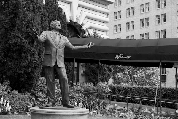A statue of singer Tony Bennett stands outside the Fairmont Hotel in San Francisco. Bennett died July 21, 2023 at 96.