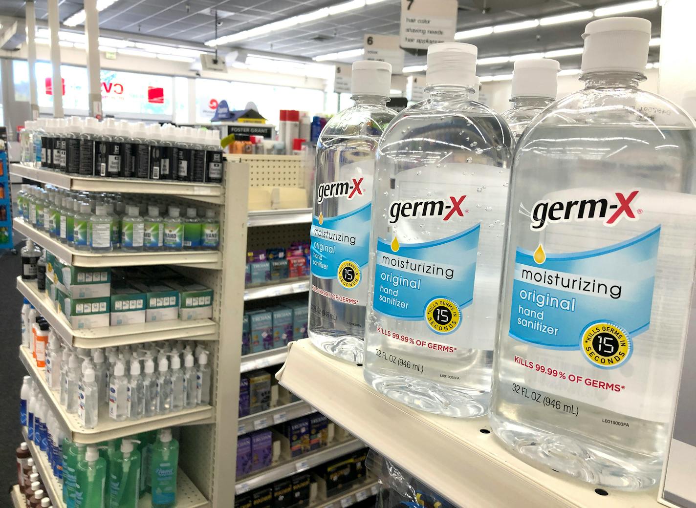 Containers of hand sanitizer are displayed on a shelf at a CVS store on May 24, 2021 in San Anselmo, California.