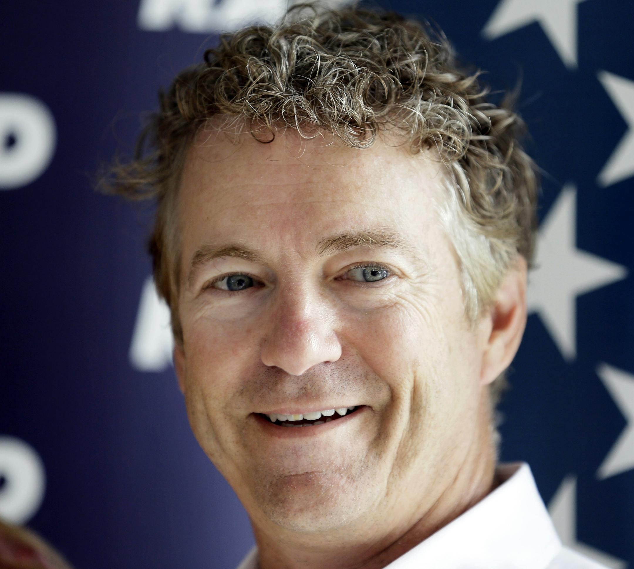 Republican presidential candidate, Sen. Rand Paul, R-Ky., waits to speak at a campaign stop at the Craig Lang farm, Thursday, July 2, 2015, in Brooklyn, Iowa. (AP Photo/Charlie Neibergall) ORG XMIT: MIN2015080420100378