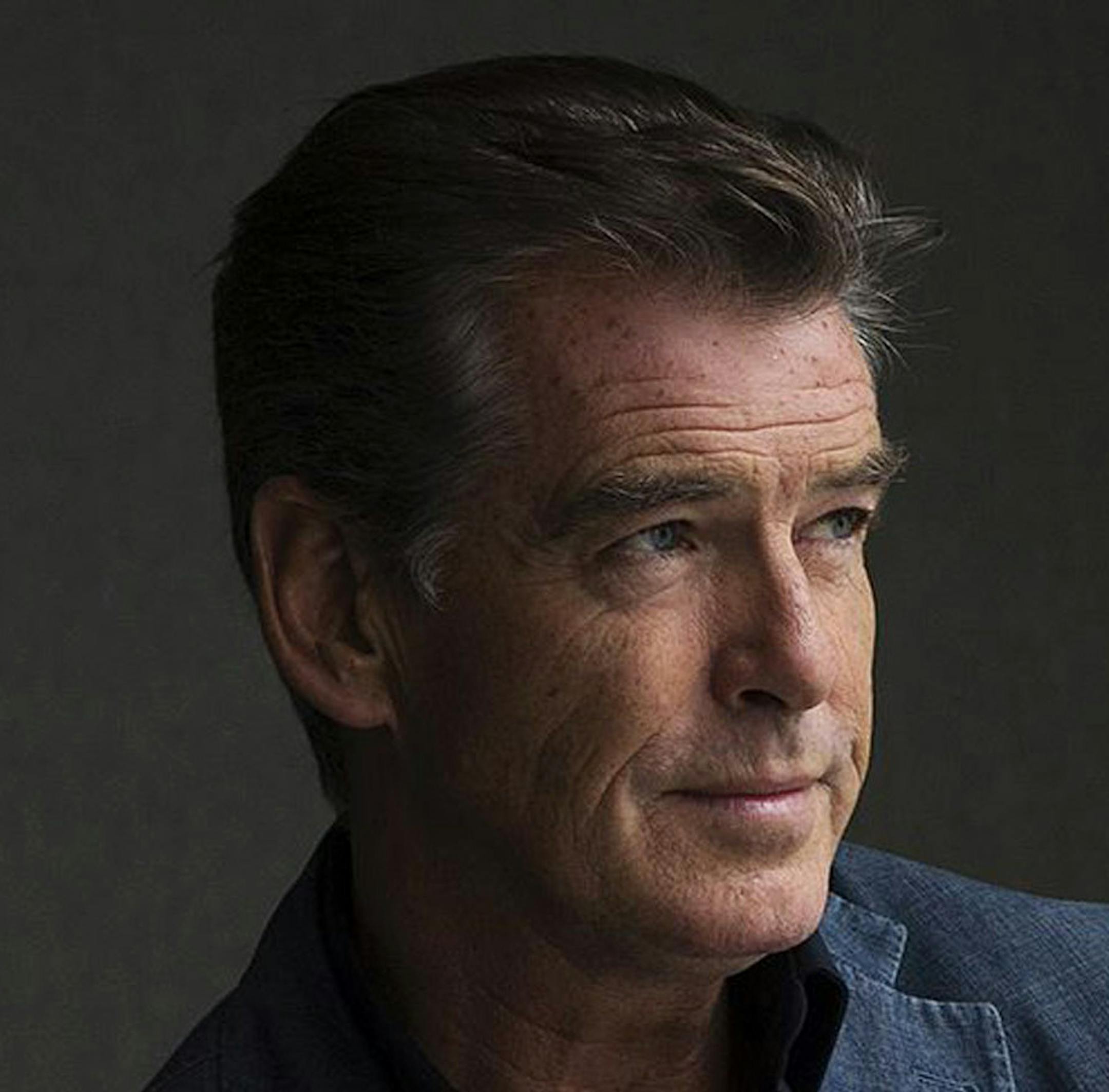 FILE - This Sept. 9, 2012 file photo shows actor Pierce Brosnan during a photo shoot to promote the movie "Love is All You Need" at the 2012 Toronto International Film Festival in Toronto. Brosnan&#xed;s daughter Charlotte died in London on June 28, after battling ovarian cancer, his publicist confirms. She was 41. Brosnan&#xed;s first wife Cassandra Harris, Charlotte&#xed;s mother, also died from ovarian cancer in 1991. (AP Photo/The Canadian Press, Michelle Siu, File)