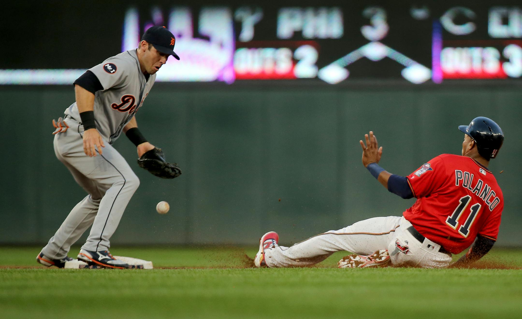 The Minnesota Twins Jorge Polanco (11) steals second with the Detroit Tigers shortstop Andrew Romine unable to handle the throw during the 2nd inning Friday, April 21, 2017, at Target Field in Minneapolis, MN. Polanco advanced to third but was left stranded.] DAVID JOLES ï david.joles@startribune.com Detroit at Twins