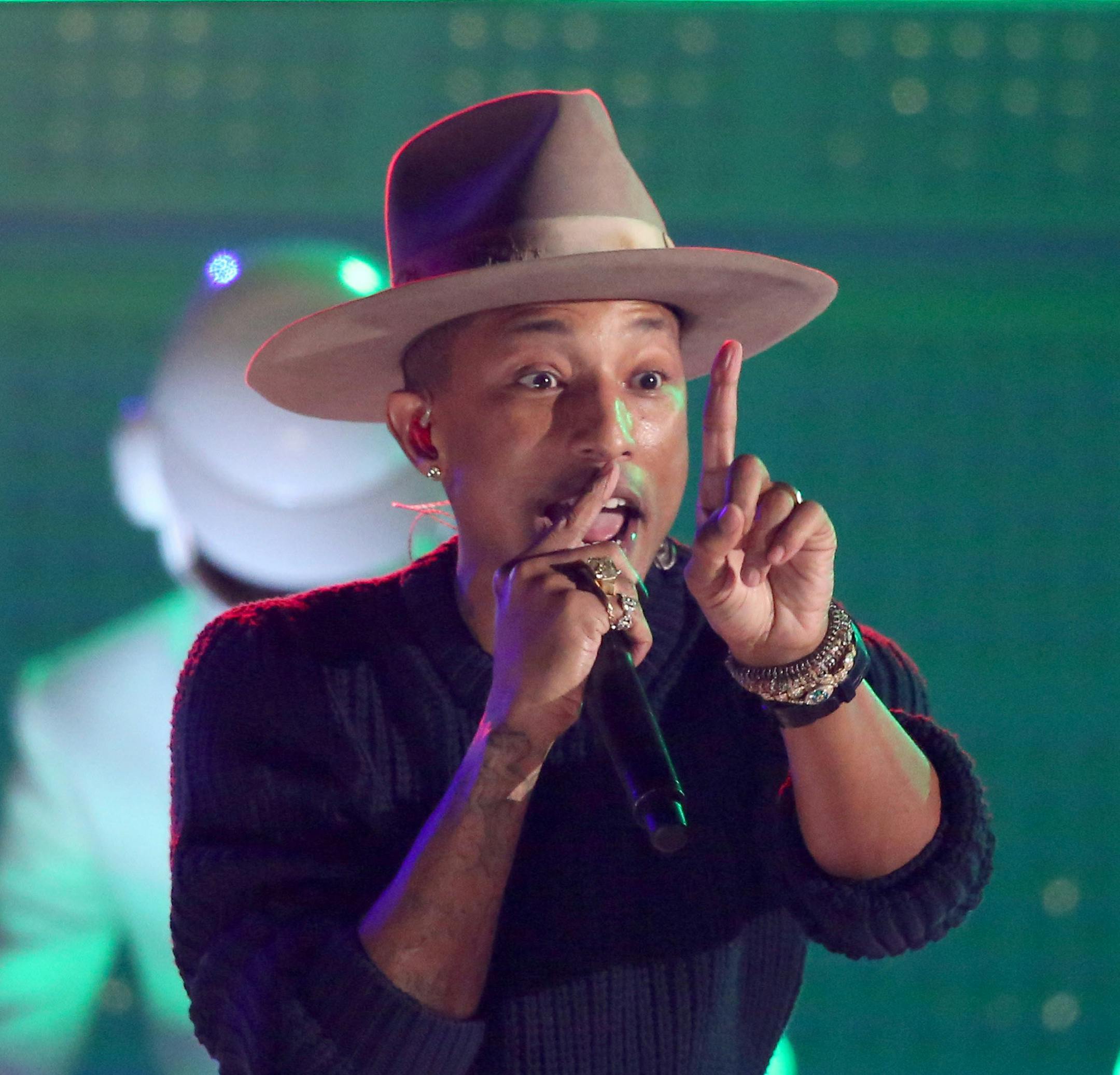 Pharrell Williams performs at the 56th annual Grammy Awards at Staples Center on Sunday, Jan. 26, 2014, in Los Angeles. (Photo by Matt Sayles/Invision/AP)