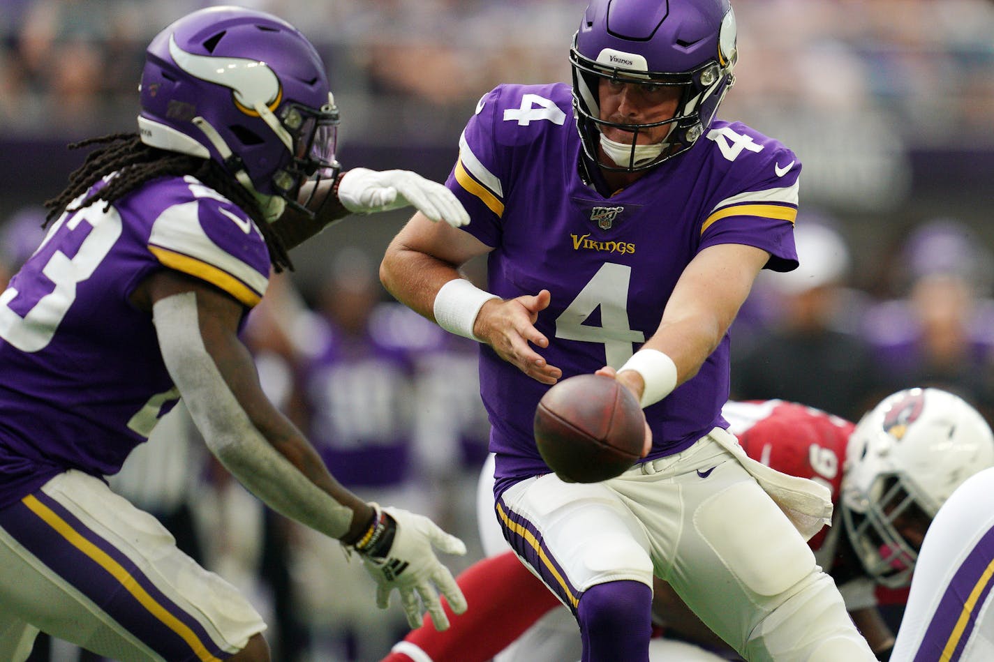 Minnesota Vikings quarterback Sean Mannion (4) handed the ball off to Minnesota Vikings running back Mike Boone (23) for a run in the second half. ] ANTHONY SOUFFLE &#x2022; anthony.souffle@startribune.com The Minnesota Vikings played the Arizona Cardinals in an NFL Preseason game Saturday, Aug. 24, 2019 at U.S. Bank Stadium in Minneapolis.