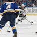 Mats Zuccarello (36) works the puck against St. Louis Blues during the first period in Game 6 .