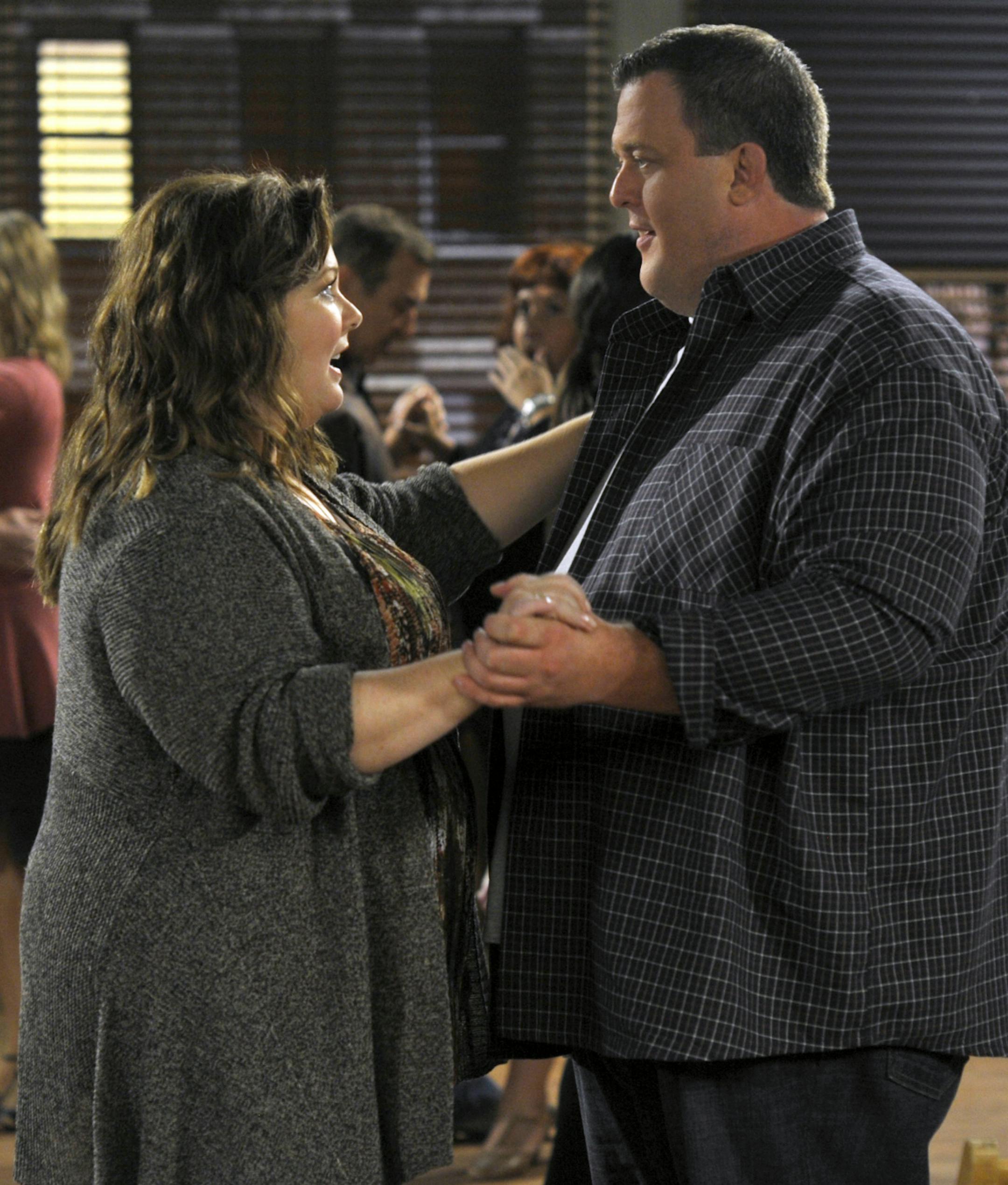 "Victoria Runs Away" -- Despite Mike's (Billy Gardell, right) good intentions, he adds fuel to the fire when Molly (Melissa McCarthy, left) and her family get in a fight, on MIKE & MOLLY, Monday, Oct. 24 (9:31-10:00 PM, ET/PT) on the CBS Television Network. Photo: Darren Michaels/Warner Bros. ©2011 Warner Bros. Television. All Rights Reserved.