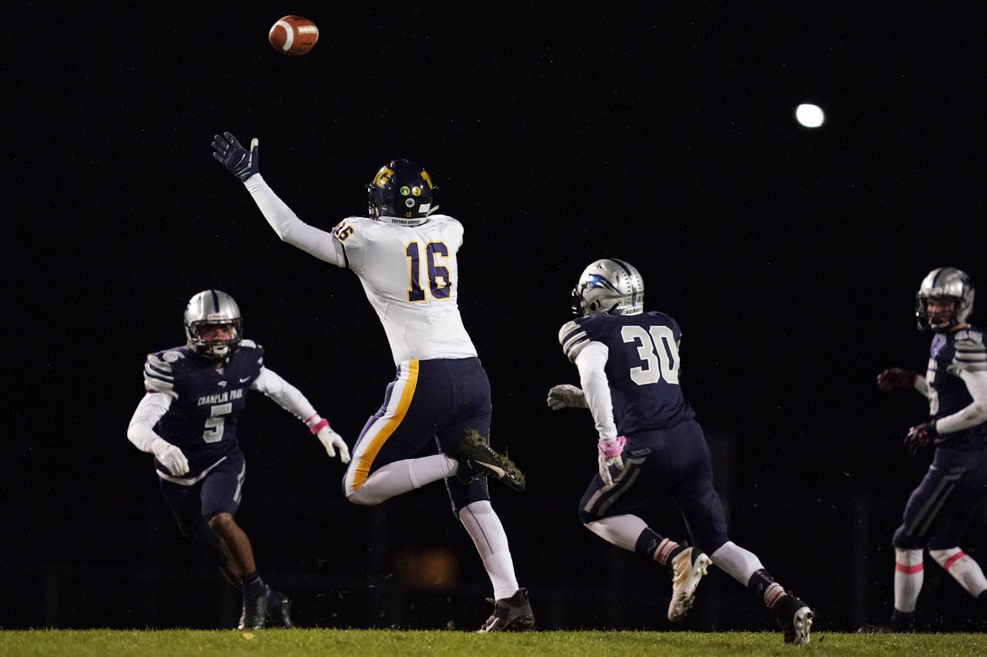 Totino-Grace tight end Joe Alt (16) reached for a long pass from quarterback Kristoff Kowalkwoski (11) in the first half.