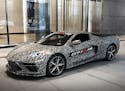 A camouflaged pre-production model of the new Corvette, to be unveiled next month. (General Motors) ORG XMIT: 1338011
