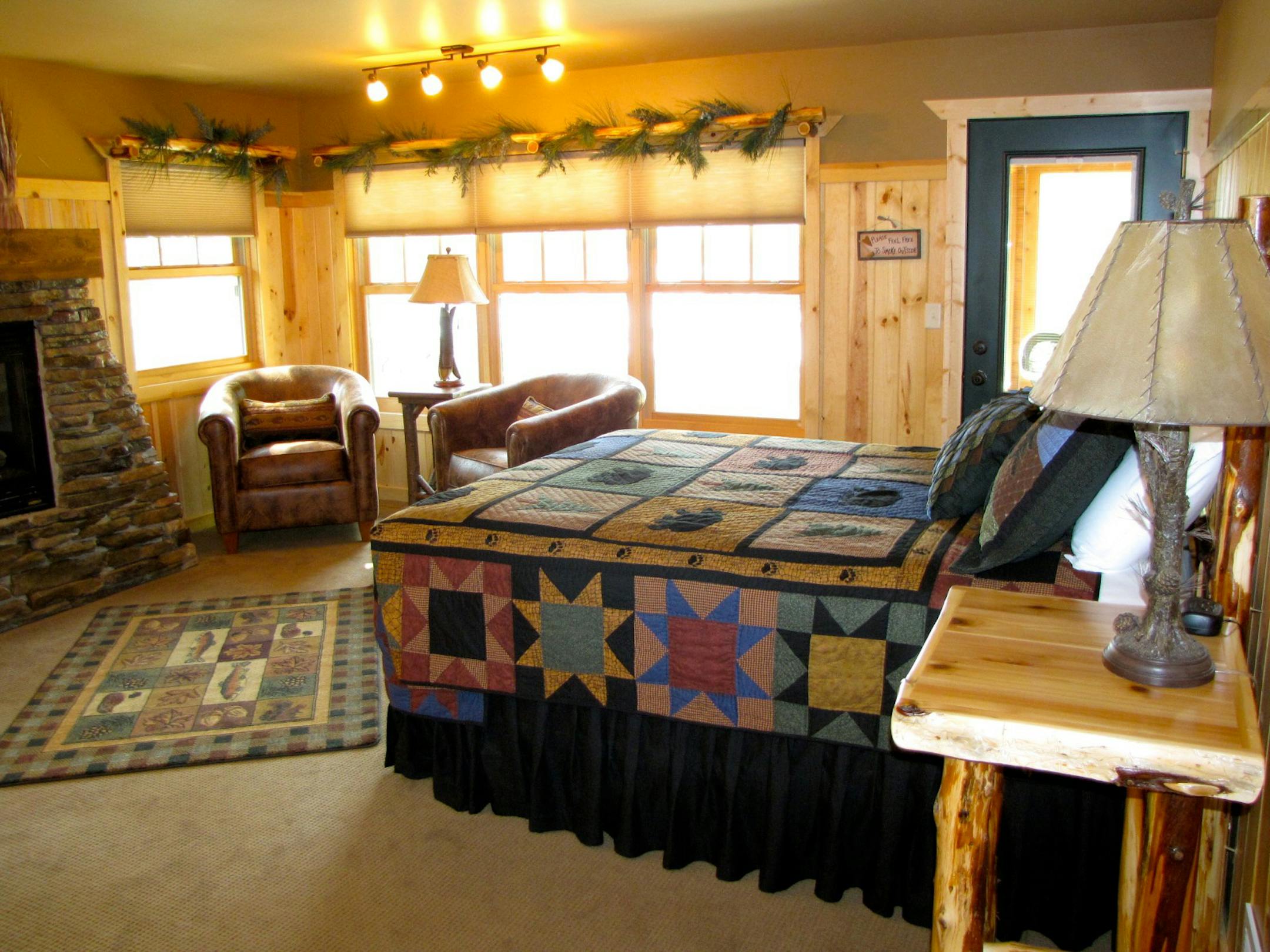 The new cottages at Clamshell Beach resort feature rustic wood furniture, colorful quilts, Whitefish Lake views and screened porches where you can listen for loons without the whine of bugs. The resort also has some of its original stucco beachside cottages from the 1930s. ] Photo by LISA MEYERS MCCLINTICK/Special to the Star Tribune