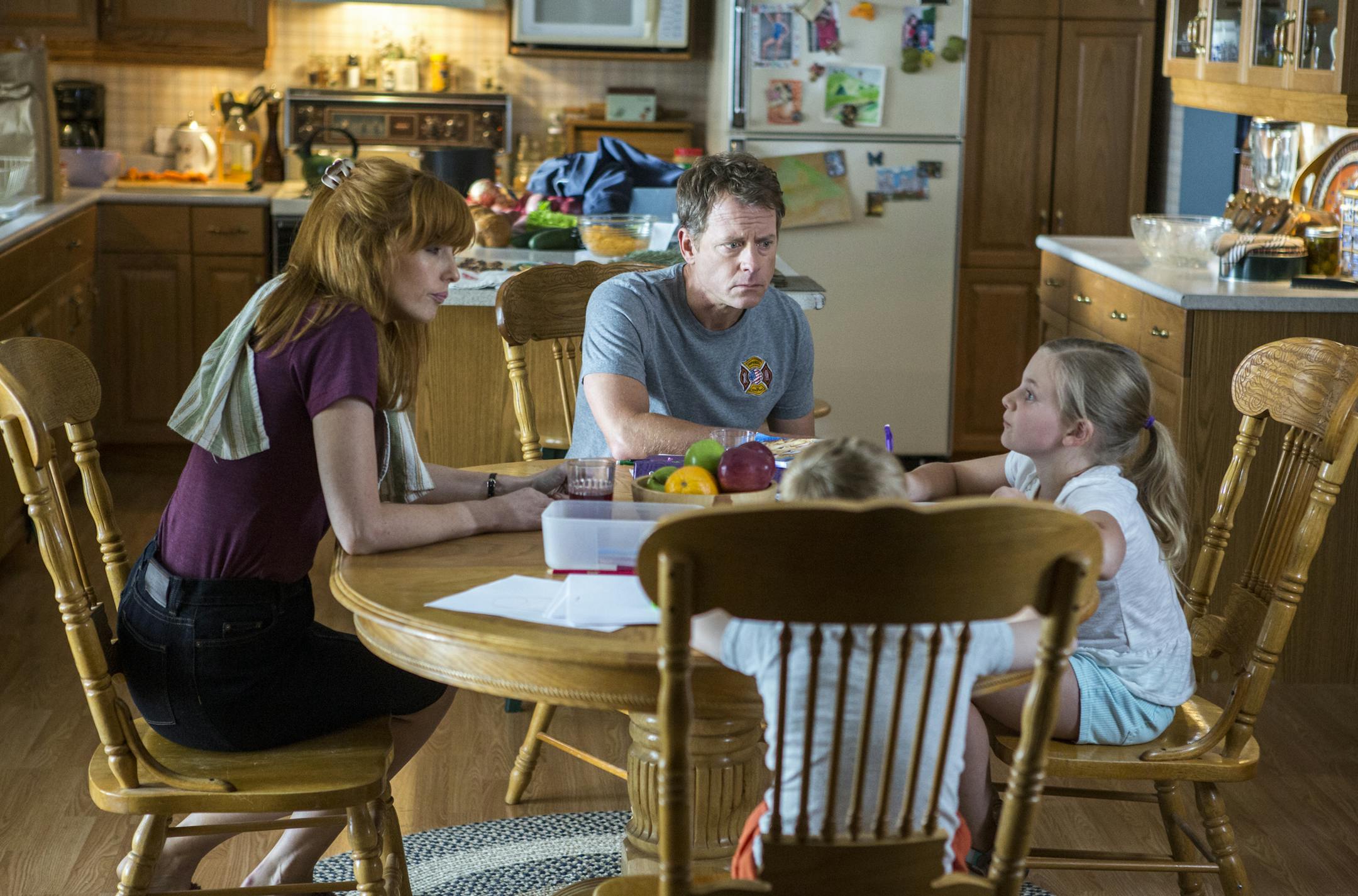 Cassie (Lane Styles, RIGHT) confesses that she punched two boys to her mom (Kelly Reilly, LEFT) and dad Todd (Greg Kinnear, CENTER) while her brother Colton (Connor Corum) looks on in TriStar Pictures' HEAVEN IS FOR REAL. ORG XMIT: Kelly Reilly (Finalized);Greg Ki
