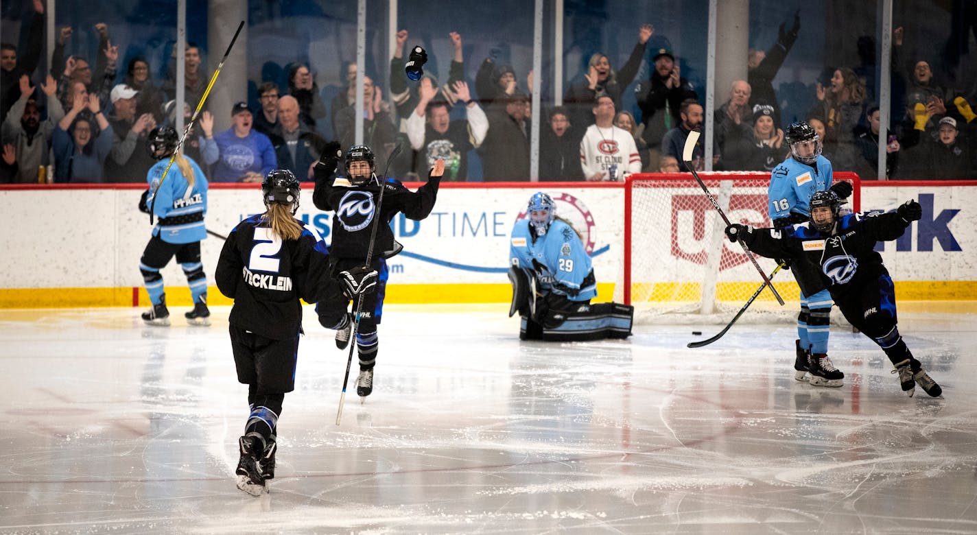 Katie Mcgovern, left, and Jonna Curtis celebrated Lee Stecklein's (2) overtime goal at Tria Rink on Sunday