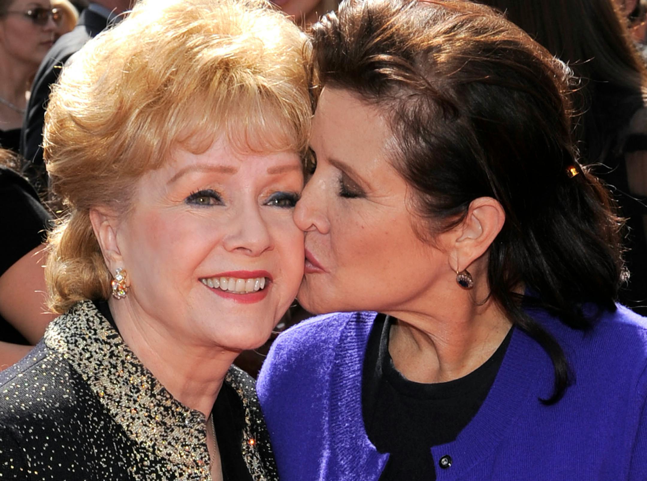 Debbie Reynolds, left, and Carrie Fisher at the Primetime Creative Arts Emmy Awards in Los Angeles on Sept. 10, 2011.