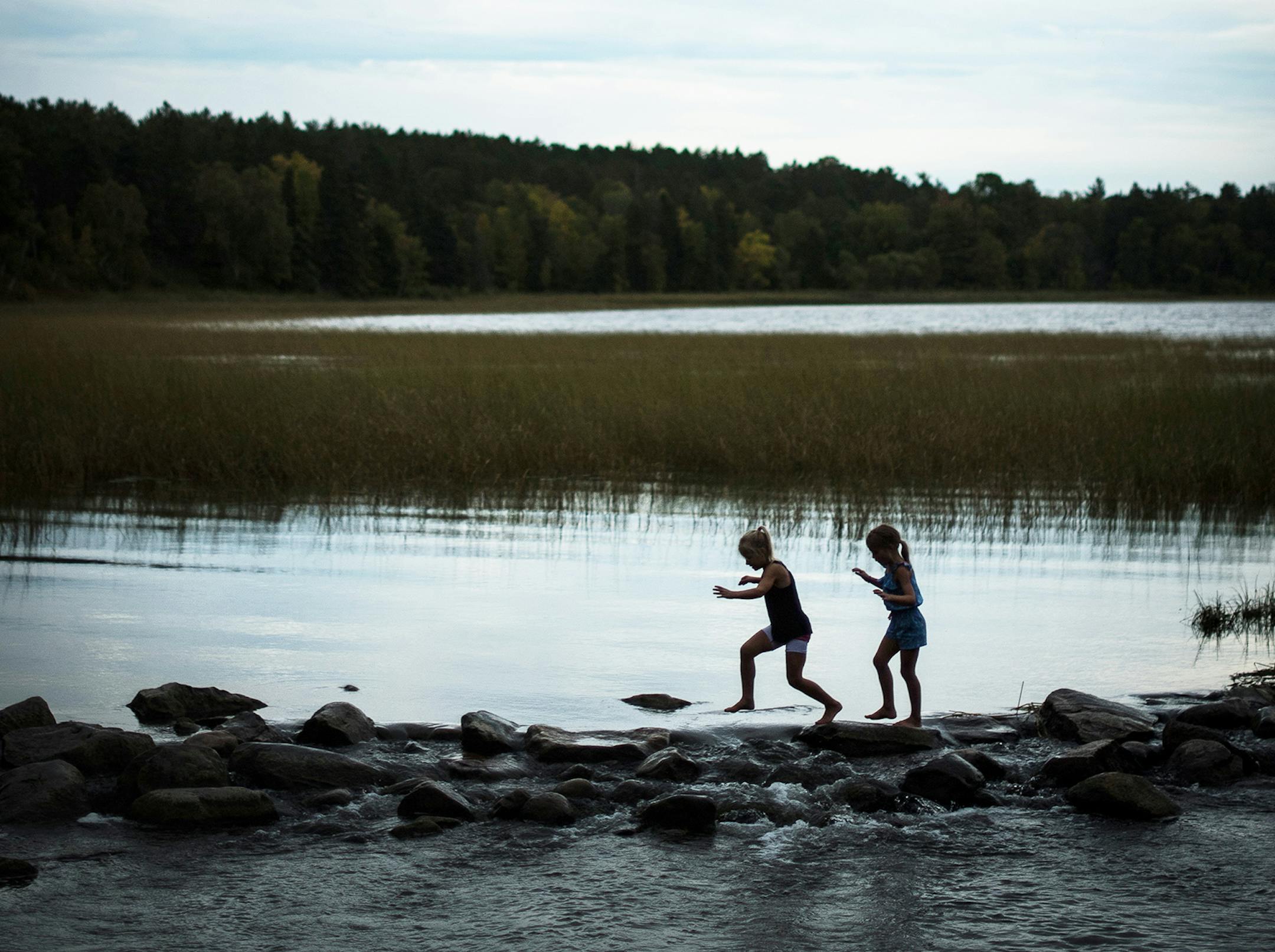 Lidia Ravaska, 8, left, and her sister Gabriella, 7, of Dassel Cokato, played on the rocks at the Mississippi Headwaters in Itasca State Park on Sunday, Sept. 18 2016. ] (AARON LAVINSKY/STAR TRIBUNE) aaron.lavinsky@startribune.com RIVERS PROJECT: We look at three of Minnesota's rivers, including the Mississippi, Red and Chippewa, to see how land use effects water quality and pollution. ORG XMIT: MIN1609182237560891 ORG XMIT: MIN1610041451170298