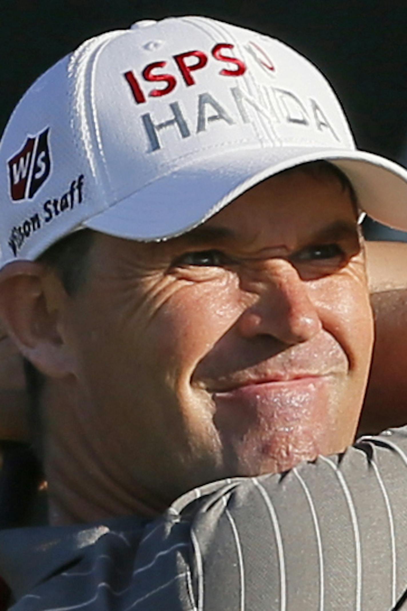 Padraig Harrington, of Ireland, watches his tee shot on the first hole during the first round of the PGA Championship golf tournament at Baltusrol Golf Club in Springfield, N.J., Thursday, July 28, 2016. (AP Photo/Tony Gutierrez)