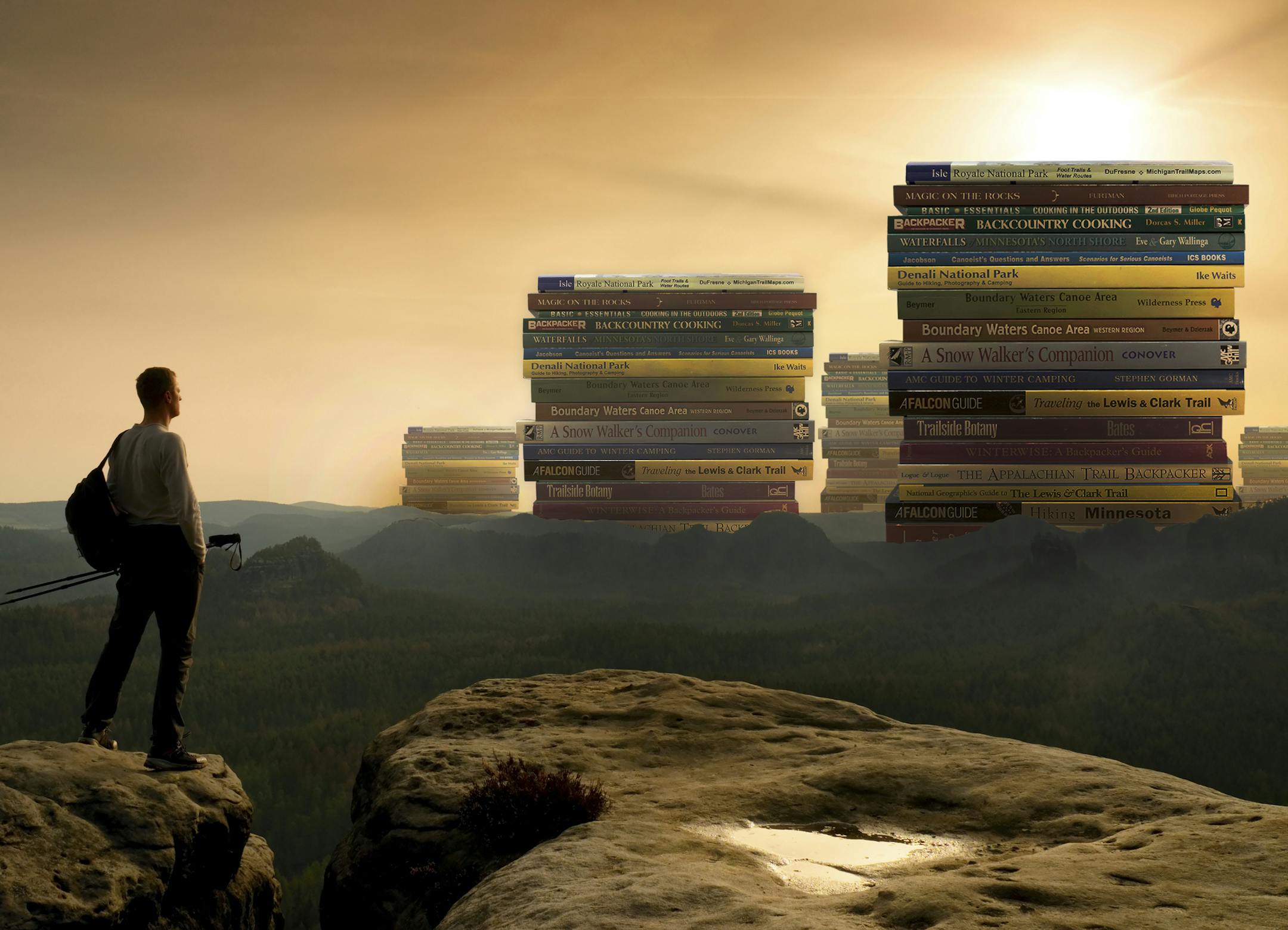 Silhouette of tourist. . Hiker with sporty backpack on rocky view point enjoying view into misty valley. Sunny spring daybreak in rocky mountains