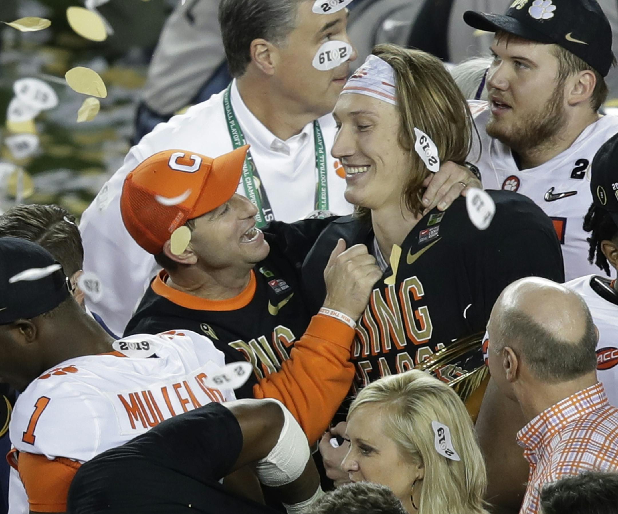 Clemson head coach Dabo Swinney celebrates with Trevor Lawrence after the NCAA college football playoff championship game against Alabama, Monday, Jan. 7, 2019, in Santa Clara, Calif. Clemson beat Alabama 44-16. (AP Photo/Jeff Chiu)
