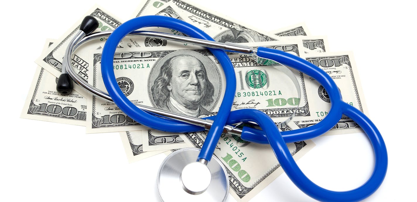 iStock
Stethoscope on US dollars isolated on white background.