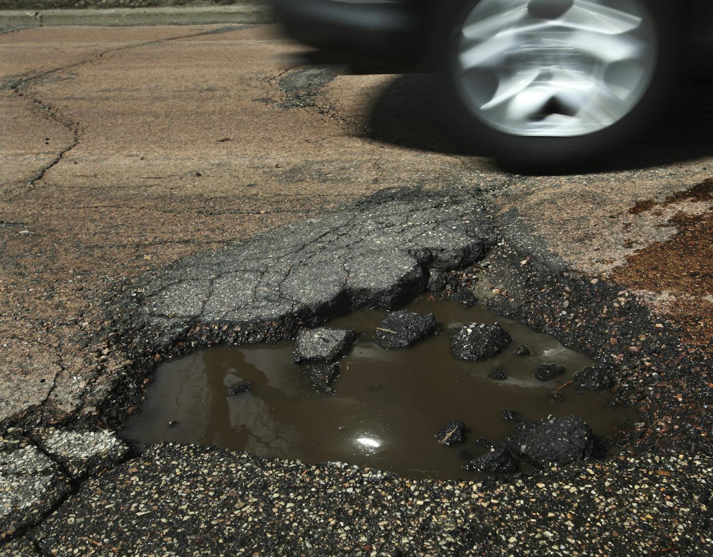 Cars driving on E. Minnehaha Parkway along Lake Nokomis tried to dodge potholes in the roadway Tuesday, April 23, 2013, in Minneapolis, MN.](DAVID JOLES/STARTRIBUNE) djoles@startribune.com On a stretch of West River Parkway, southbound drivers have been known to shift into the oncoming lane to avoid the plethora of potholes. The surface has been patched so many times that the jolting can leave a cyclist feeling scatter-brained. Help is on the way for this stretch of road, which will be closed ne