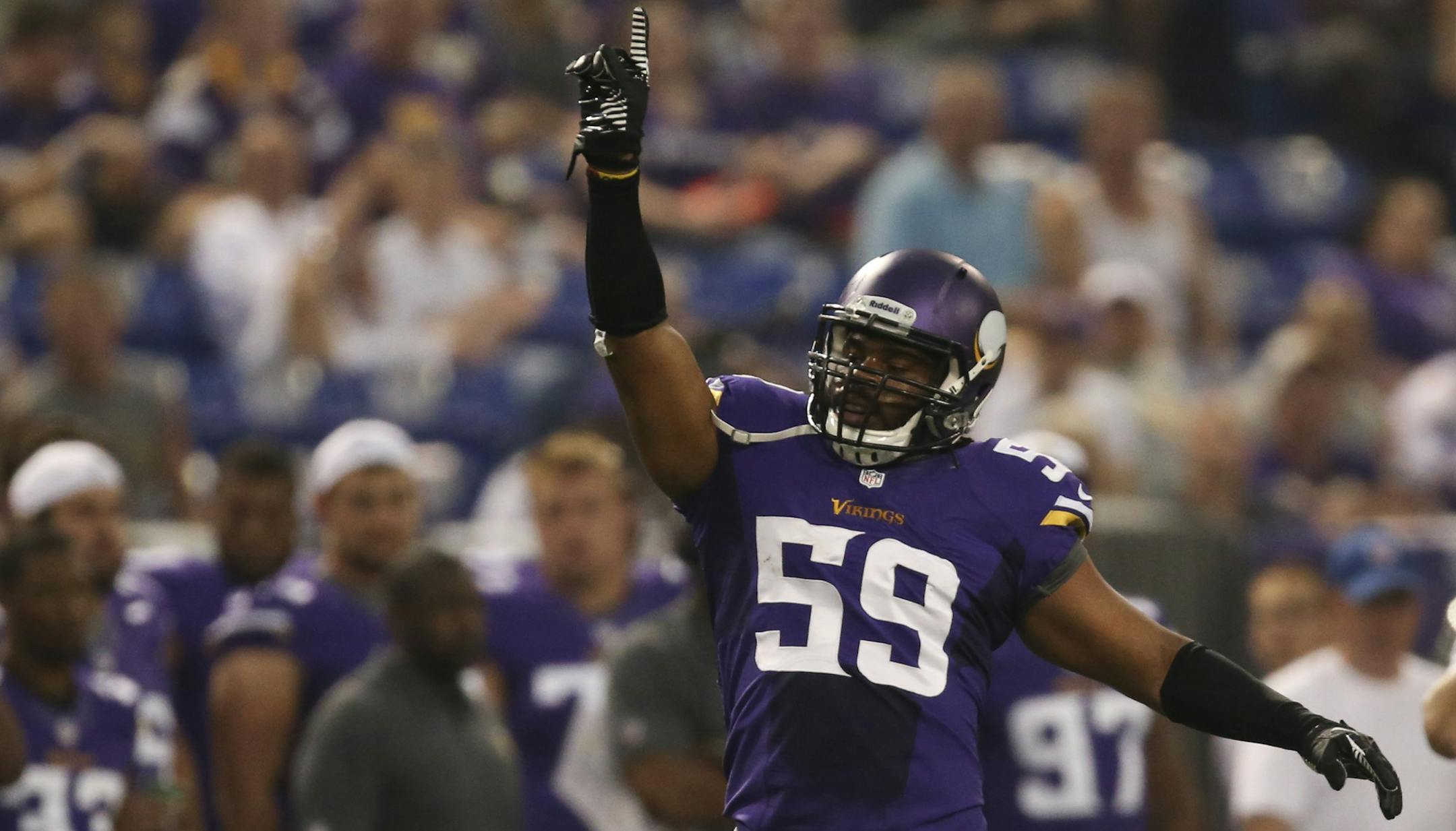 The Minnesota Vikings played their final preseason game against the Tennessee Titans Thursday night, August 29, 2013 at Mall of America Field in Minneapolis. Minnesota's Desmond Bishop celebrated after stopping Titans' running back Jackie Battle for a four yard loss in the first quarter. ] JEFF WHEELER ‚Ä¢ jeff.wheeler@startribune.com