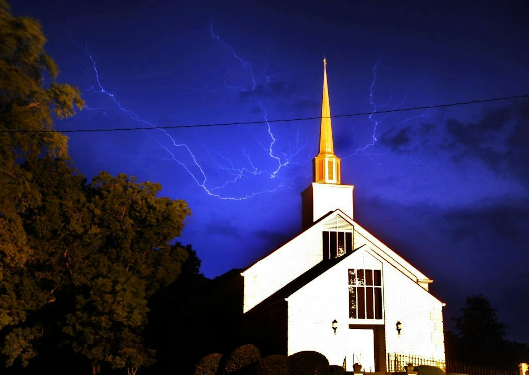 Lightning streaks above Cornith Baptist Church in Athens, Ga.,