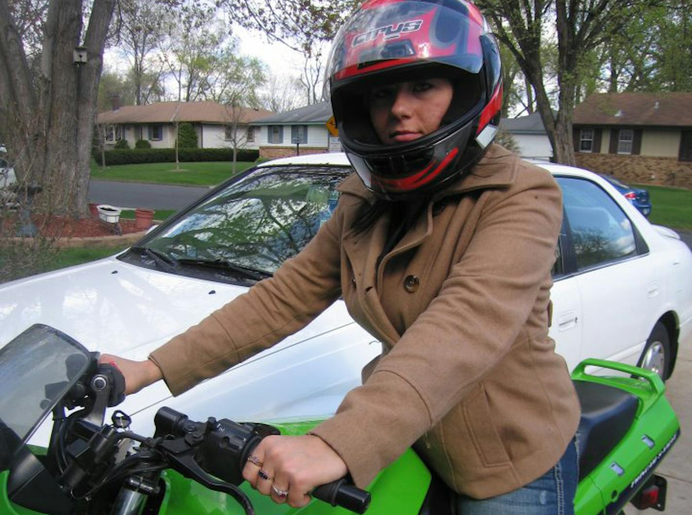 Brittany Larson wore a helmet when she posed for a picture.