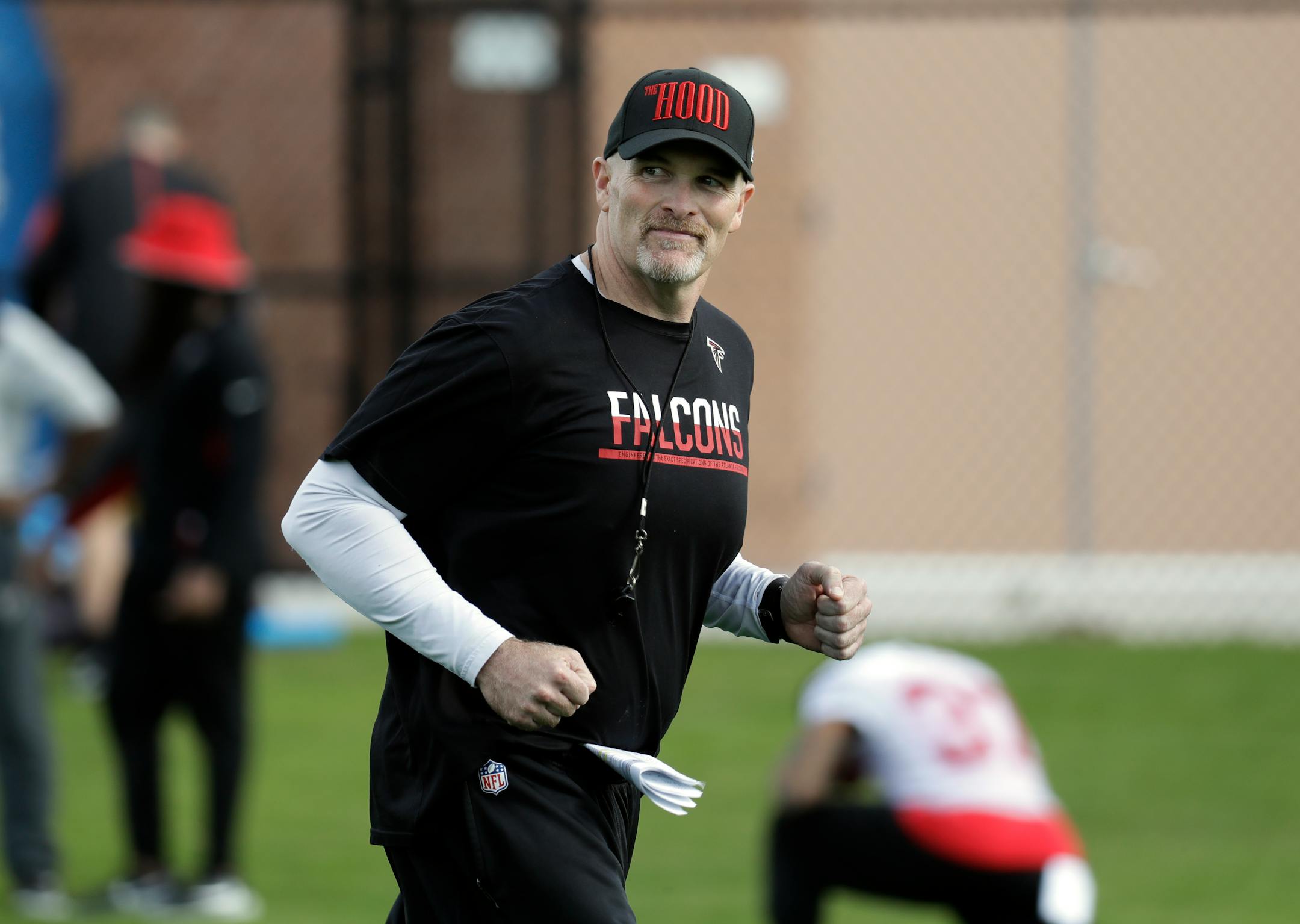 Atlanta Falcons head coach Dan Quinn keeps watch over a practice for the NFL Super Bowl 51 football game Wednesday, Feb. 1, 2017, in Houston. Atlanta will face the New England Patriots in the Super Bowl Sunday. (AP Photo/Eric Gay)