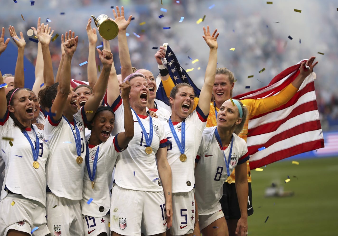 Megan Rapinoe holds the trophy celebrating at the end of the Women's World Cup final soccer match between US and The Netherlands.