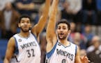 Timberwolves guard Ricky Rubio (9) and center Karl-Anthony Towns (32)
