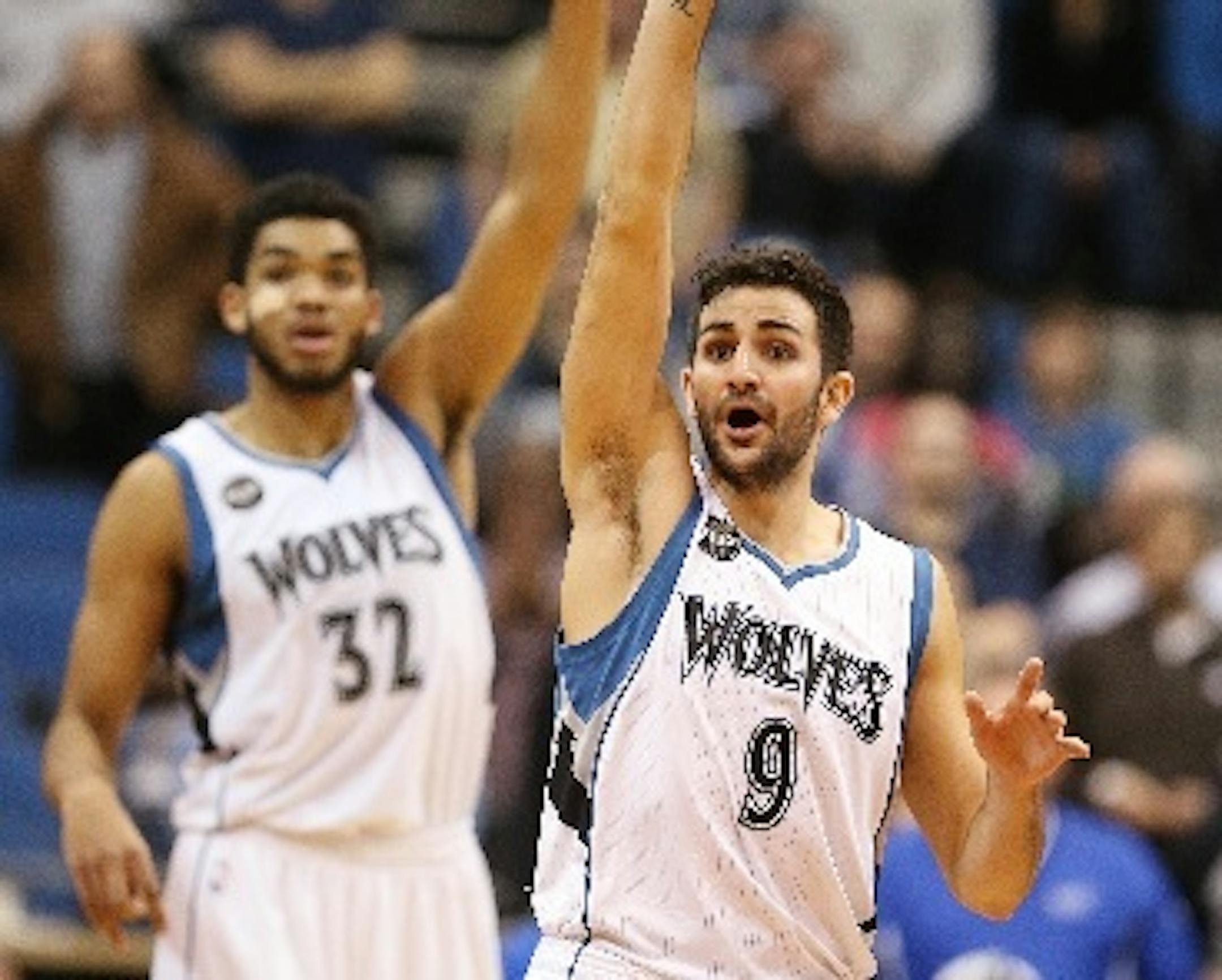 Timberwolves guard Ricky Rubio (9) and center Karl-Anthony Towns (32)