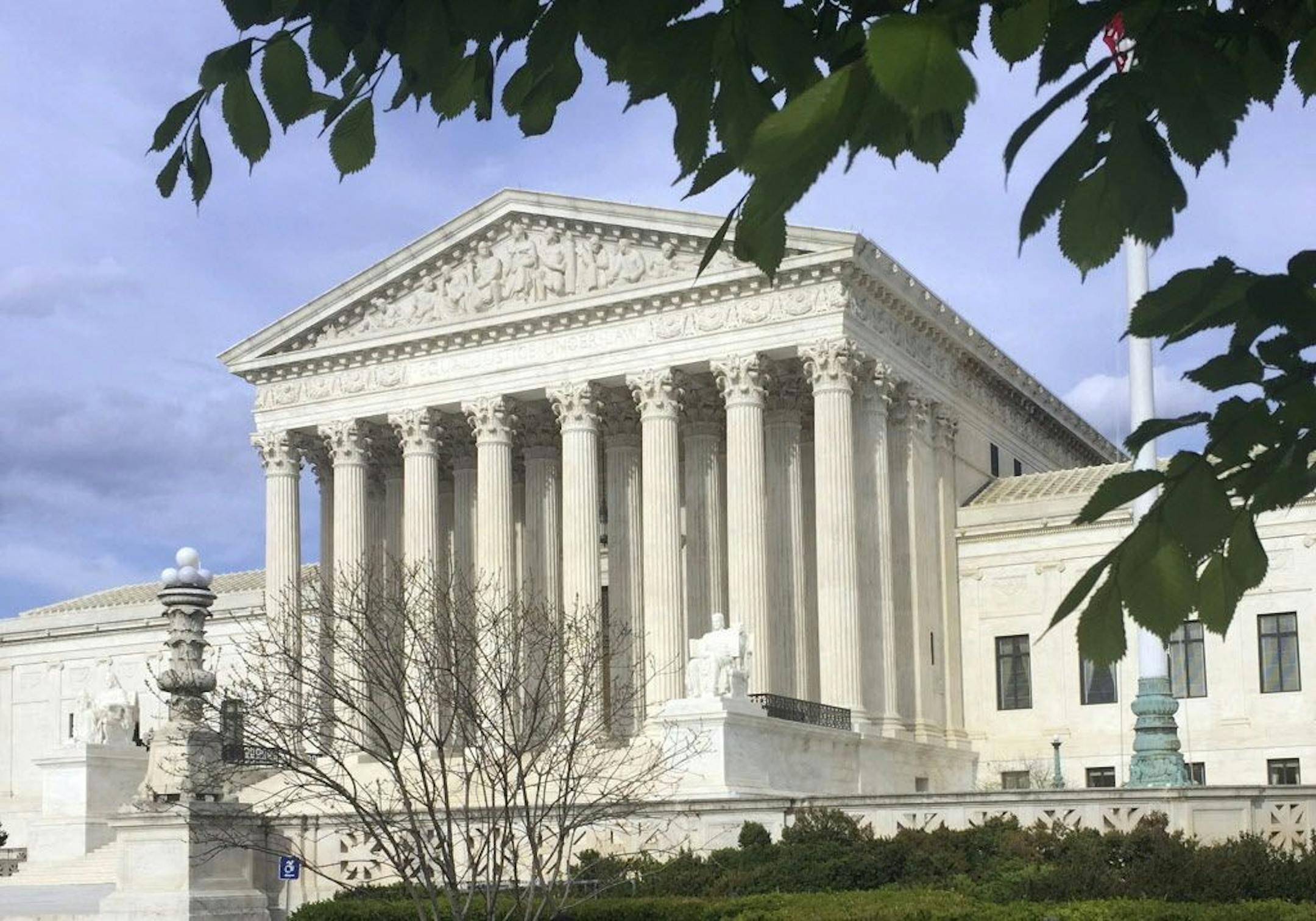 FILE - This April 23, 2018, file photo shows the Supreme Court in Washington. The Supreme Court says states can force online shoppers to pay sales tax. The 5-4 ruling Thursday is a win for states, who said they were losing out on billions of dollars annually under two decades-old Supreme Court decisions that impacted online sales tax collection. The high court ruled Thursday to overturn those decisions.