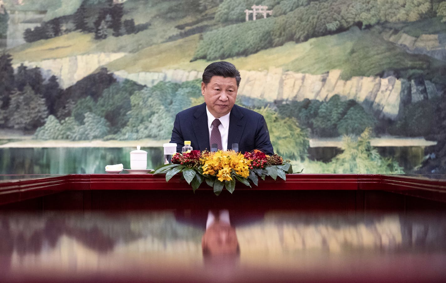 China's President Xi Jinping attends a meeting with North Korean Foreign Minister Ri Yong Ho at the Great Hall of the People in Beijing, Friday, Dec. 7, 2018. North Korea's foreign minister said his country remains committed to ending its nuclear weapons program in talks Friday with his Chinese counterpart, according to China's foreign ministry. (Fred Dufour/Pool Photo via AP)